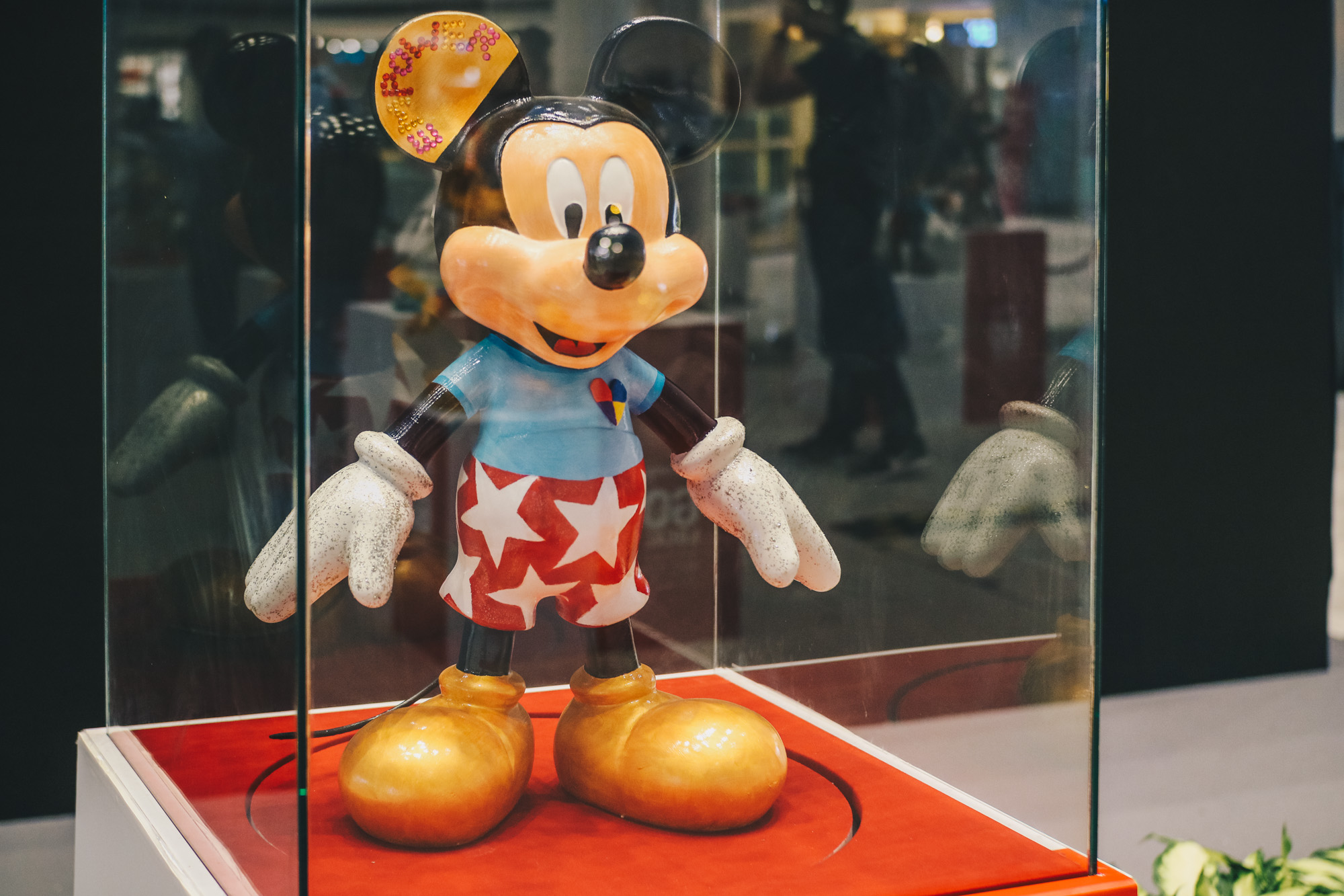 "Mickey Go Local" - 90 Mickey Mouse Figurines on display at Raffles City Singapore