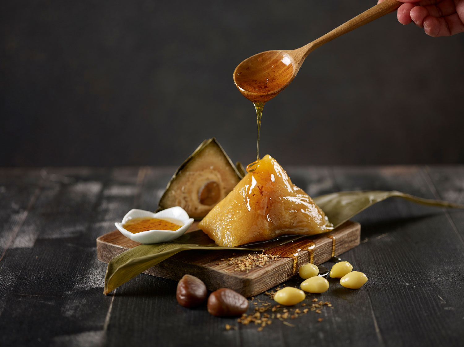 Holiday-Inn-Singapore-Atrium_Xin's-Signature-Red-Lotus-Seed-Paste-Dumpling-served-with-Osmanthus-Sauce